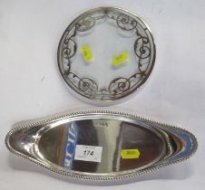 A hallmarked silver oval stand, with gadrooned edge, together with a circular glass stand with