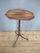 A 19th century mahogany occasional table with octagonal top and on a tripod base, height 29ins,