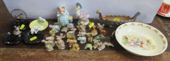 A collection of Wade Whimsies, including ash trays, together with Bunnykins items