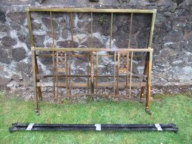 An Edwardian Maples and Co. brass bedstead