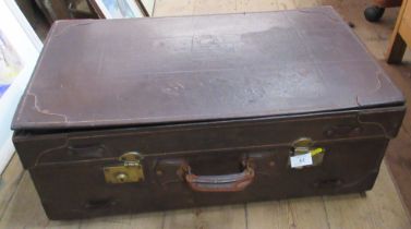 An Orient Leather Company vintage suitcase