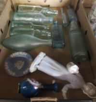 A box of antique and later glass bottles together with ornaments