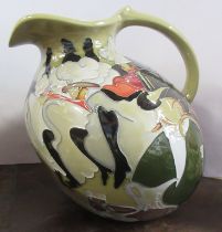 A Moorcroft jug, decorated in the Pigalle pattern, designed by E.Bossons, height 8.5ins