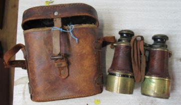 A cased pair of vintage binoculars
