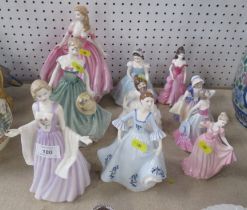 A collection of Royal Doulton figurines, and a Royal Albert figure