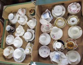 Two boxes of cabinet cups and saucers