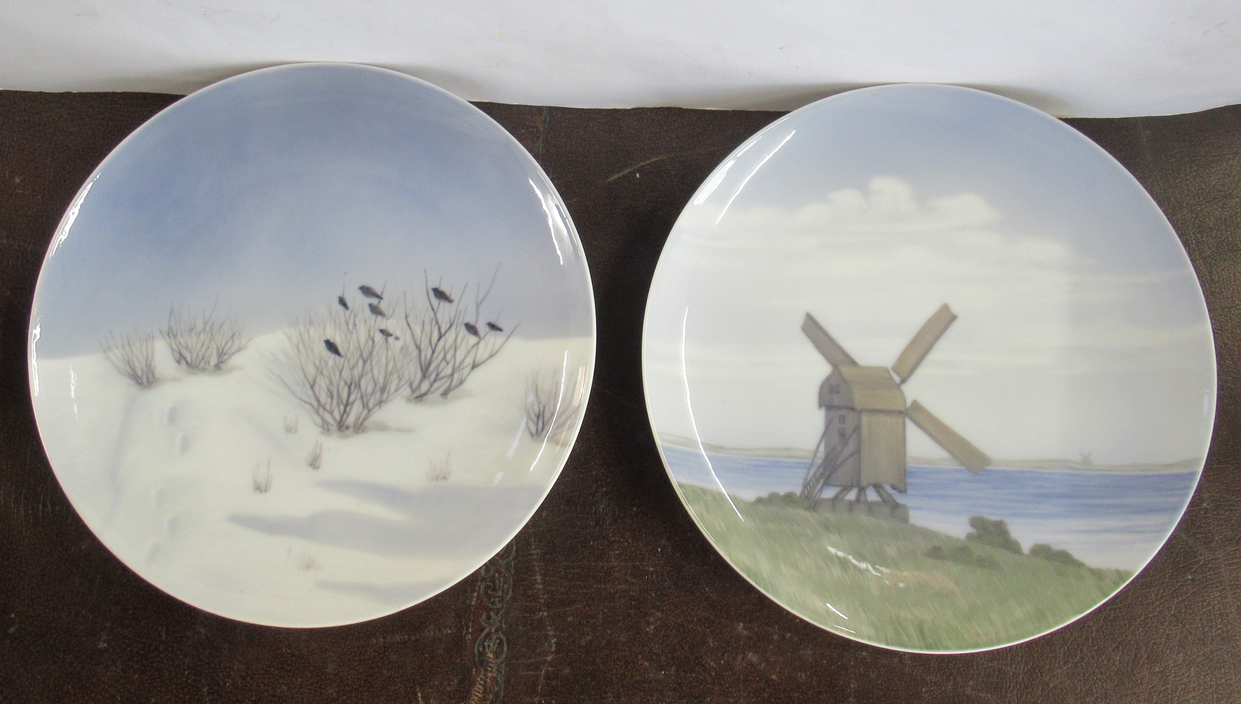 Two Royal Copenhagen plates, one with windmill, the other with birds in a bush both, pre 1923