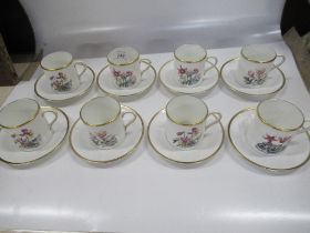 A Royal Worcester coffee set together with a new Chelsea coffee set