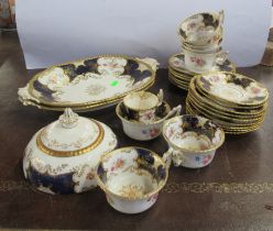 A Coalport part tea service, decorated with flowers to a gilt and blue ground Condition Report:
