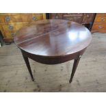 A 19th century mahogany fold over table, width 37ins