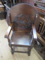 An Antique design monks chair, with fold over table top, width 28ins