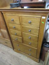 A modern chest of drawers width 35ins, height 54ins, depth 18ins