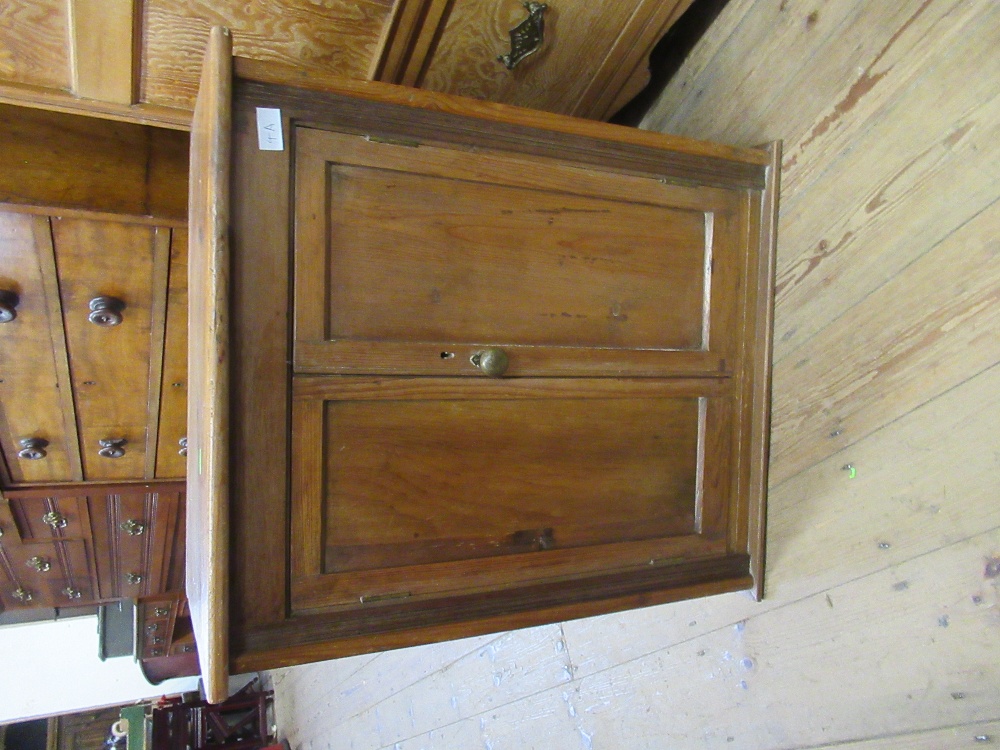 A pine cabinet, width 24ins, height 27ins, depth 14ins