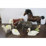 A collection of Beswick, to include a Hereford Bull, bay Shire horse, elephant, sheep, bird and