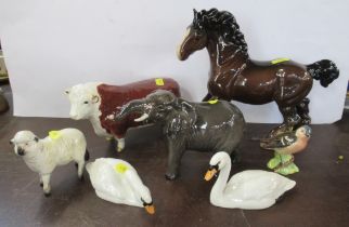 A collection of Beswick, to include a Hereford Bull, bay Shire horse, elephant, sheep, bird and