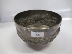 A white metal bowl decorated with Farmyard scenes and a man ploughing diameter 8ins, weight 17oz