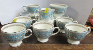 A Wedgwood part coffee set, in the Florentine pattern, 6 cups, 6 saucers, milk jug and sugar bowl