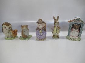 A collection of Royal Albert  Beatrix Potter figures to include, Mrs Rabbit and Bunnies, Benjamin