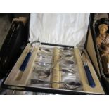 A box of metalware, flatware etc