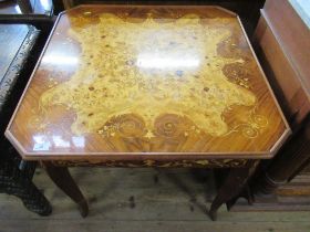 A games table with inlaid decoration, the top revealing chess and bat gammon board, the top then