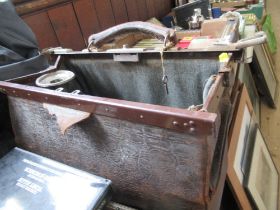 A vintage bag and contents, including Egyptian model, tankards etc