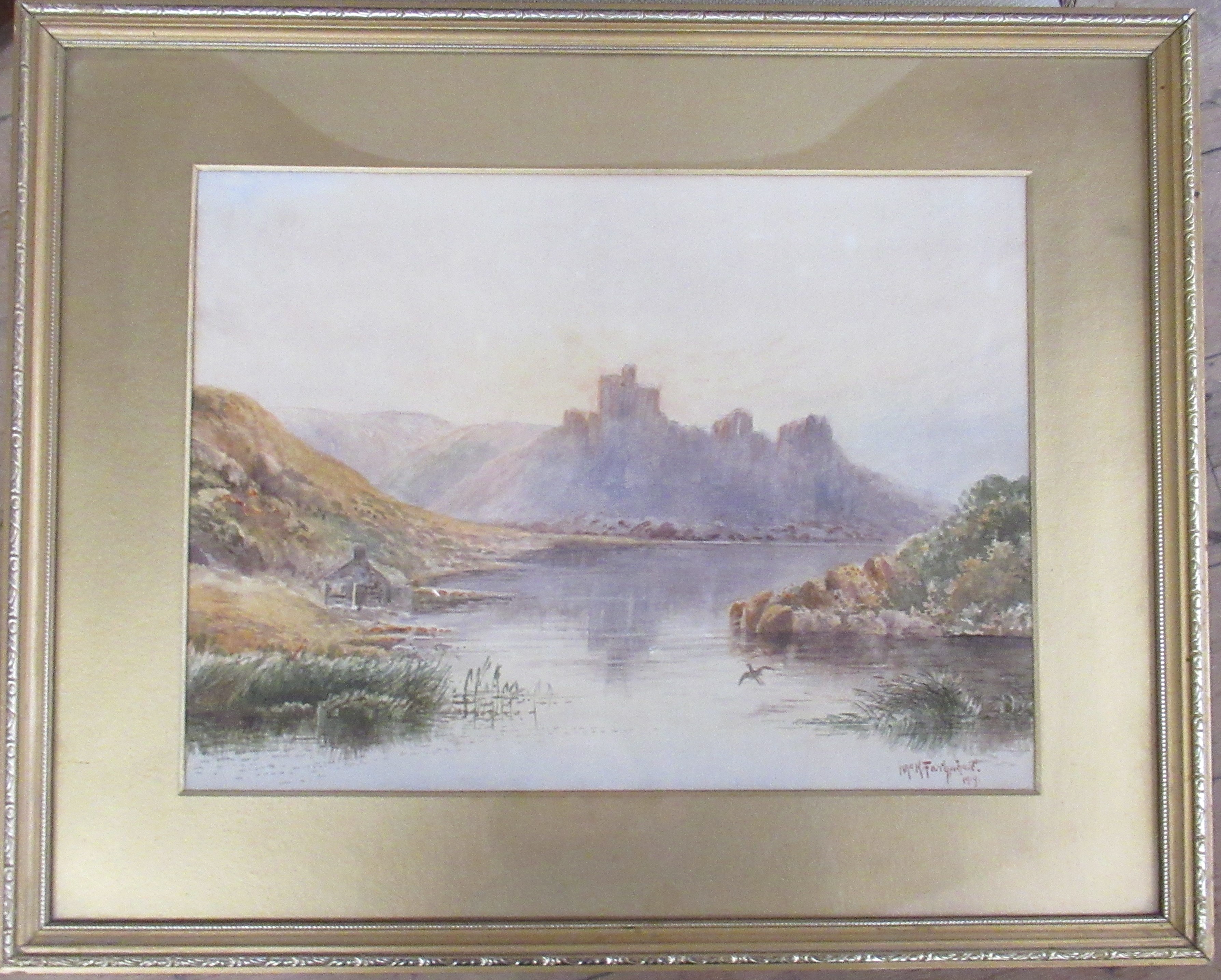 McK Farquaeface??, watercolour, view across water with castle on a hill, dated 1919, 11ins x 15ins