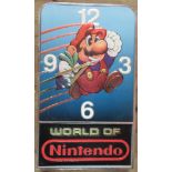 A world of Nintendo Mario wall clock, of rectangular form, 19.5ins x 12ins