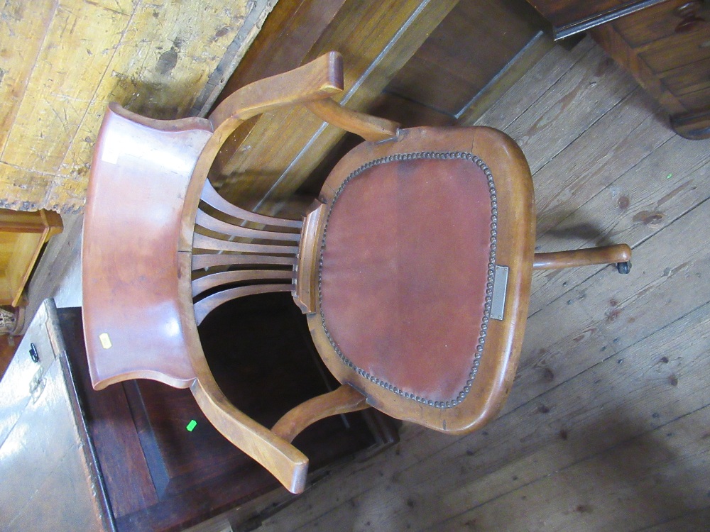 An Edwardians captains chair with plaque