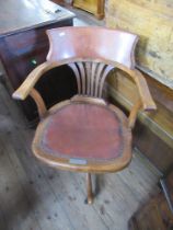 An Edwardians captains chair with plaque