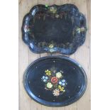 Two 19th century black papier mache trays, one oval, the other shaped rectangular, both decorated