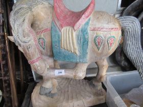 A wooden carving of a horse, height 23ins