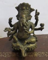 A brass model, of an Indian deity, height 5ins