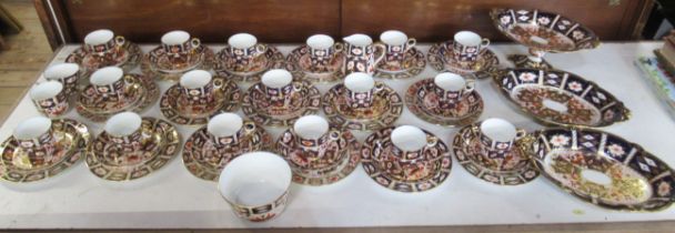 A Royal Crown Derby part tea set, all decorated in the 2451 Imari pattern, comprising sugar bowl,