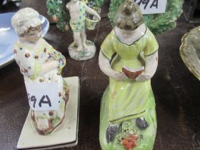 Four Antique porcelain models to include a pair of figures