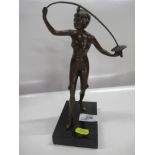 A bronze model of a lady holding a sword