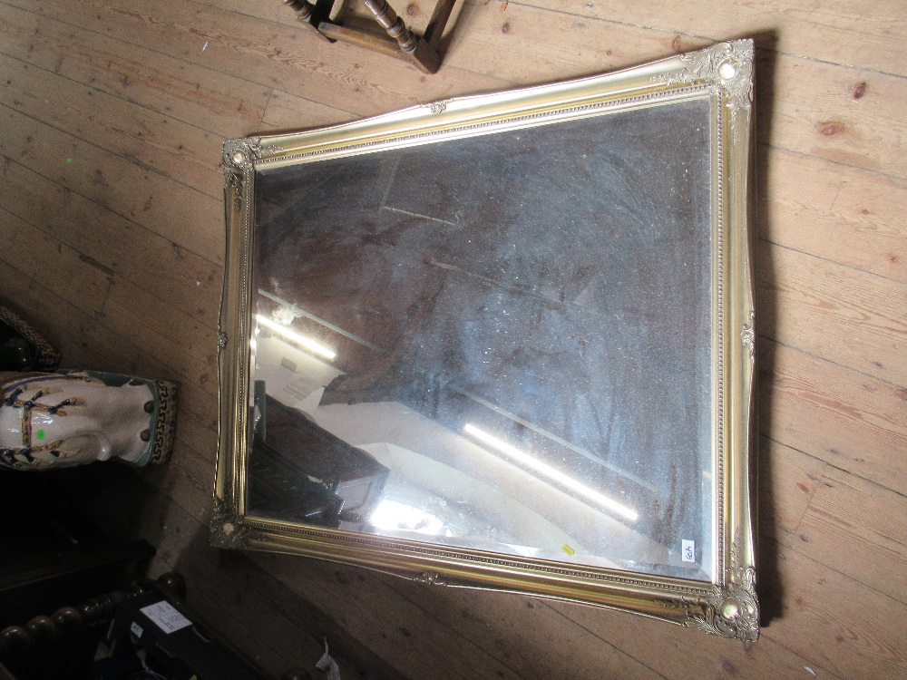 A large rectangular gilt framed mirror, 44ins x 36ins