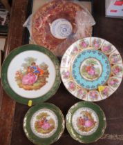 A boxed Royal Worcester cabinet plate, together with four Limoges plates