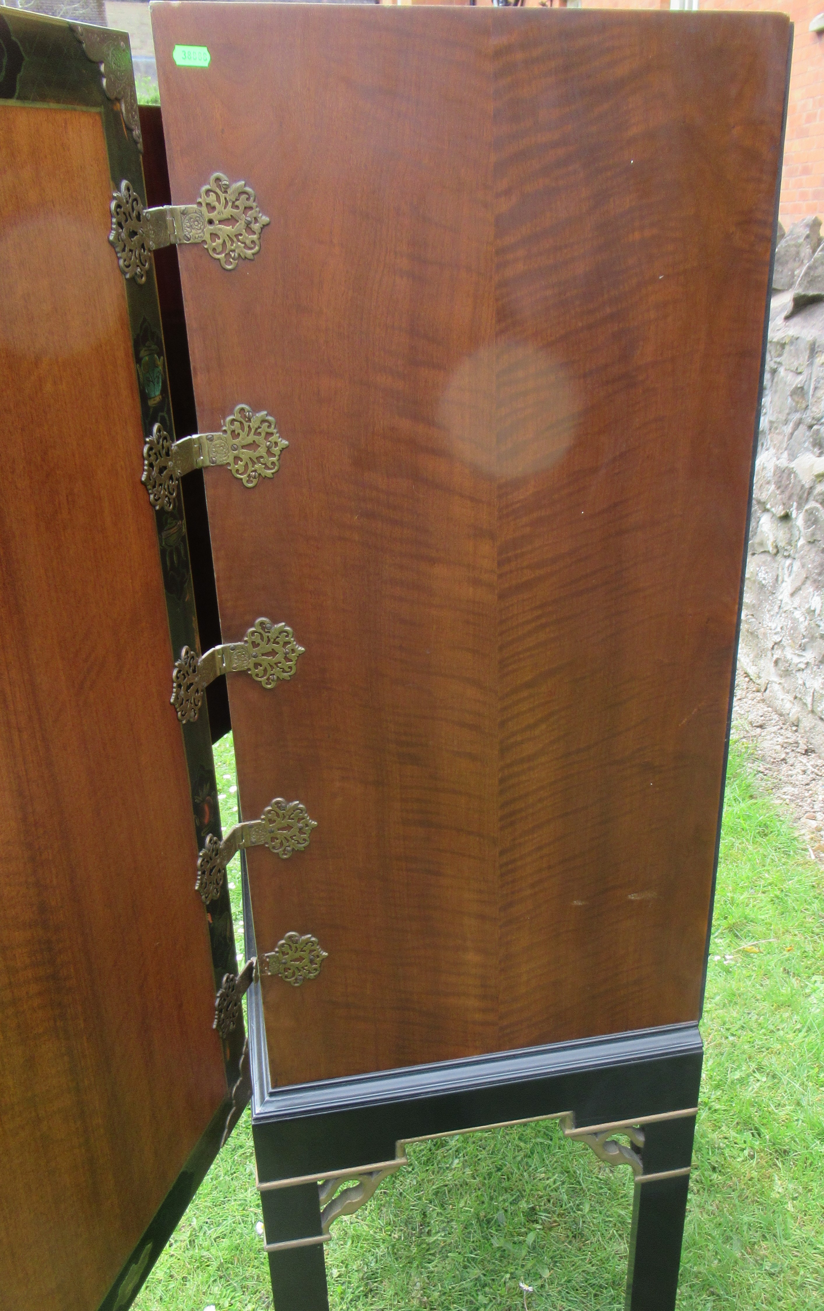 An Eastern design cabinet with painted decoration and applied gilt mounts raised on a stand, width - Image 4 of 5