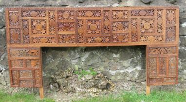 An Eastern design head board and another