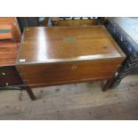 A mahogany chest with brass banding and carrying handles raised on a stand width 36ins depth 22ins