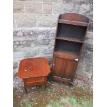 A sewing table together with an oak set of shelves with cupboard below