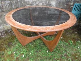 A mid century glass topped coffee table, width 33ins