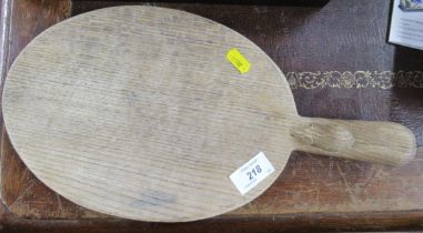 A Robert 'Mouseman' Thompson cheeseboard, with carved mouse on the handle, width 15ins