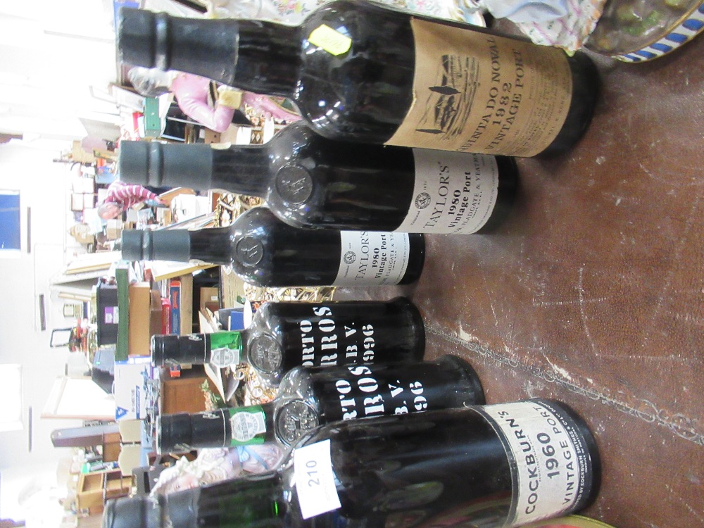 A collection of 5 bottles of Vintage Port, including  Taylor's 1980 vintage port x 2, Porto Barros