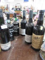 A collection of 5 bottles of Vintage Port, including  Taylor's 1980 vintage port x 2, Porto Barros