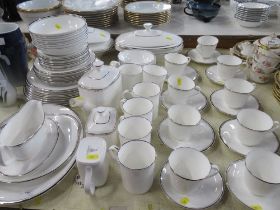 A collection of Royal Doulton Platinum Concorde pattern dinner and tea ware