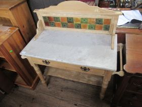 A pine marble top wash stand with tiled back , width 41ins, depth 19ins, height 43ins