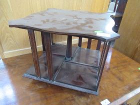 A small Edwardian table top revolving book stand width 16ins, height 12ins