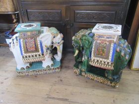 Two similar elephant painted garden seats, of oriental design, heights 20ins, af
