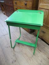 A painted green child's desk width 20ins, height 29ins